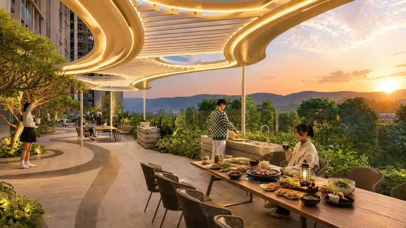BBQ Garden trên cao tại Beachtro Tower: bàn tiệc nướng ngoài trờI dưới giàn che, nhìn ra núi và hoàng hôn