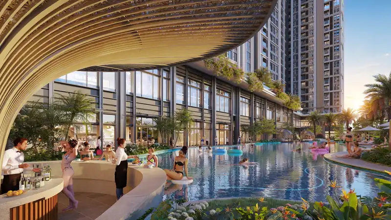 Tro Oasis Pool tại Beachtro Tower: bể bơi ốc đảo có quầy pool bar dưới mái vòm, cư dân thư giãn bên làn nước