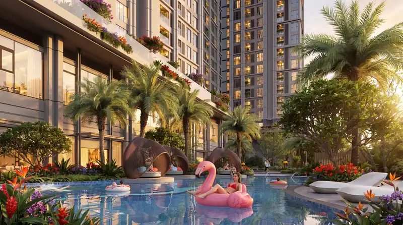 Bể bơi và khu vui chơi nước Water Playground tại Beachtro Tower với phao hồng hạc, cây cọ và hoa nhiệt đới
