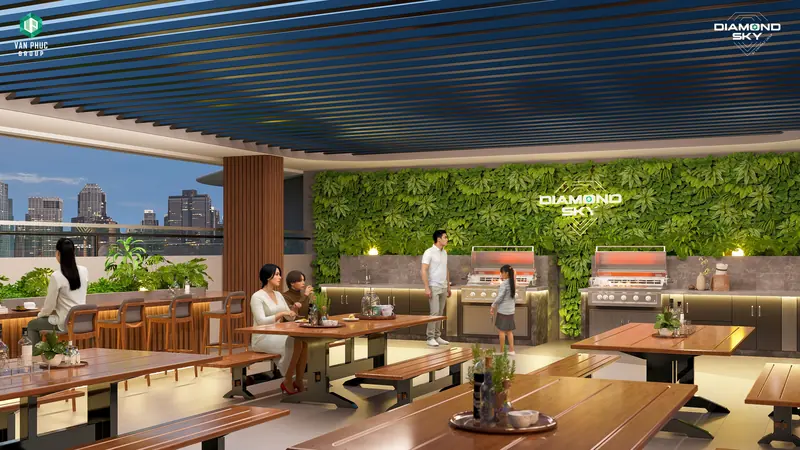 Vườn BBQ hoàng hôn trên tầng mái Diamond Sky với bàn tiệc ngoài trời và tường cây xanh