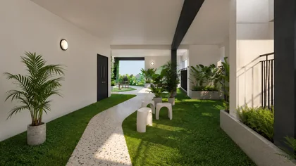 Lối dạo đá trắng giữa thảm cỏ ở vườn trên mây tầng 20 Gem Park