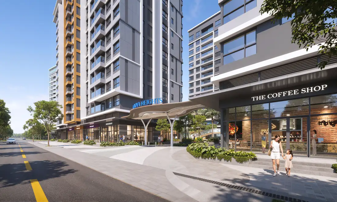 Cổng chào biểu tượng và dãy căn thương mại dịch vụ khối đế Gladia Heights trên trục đường