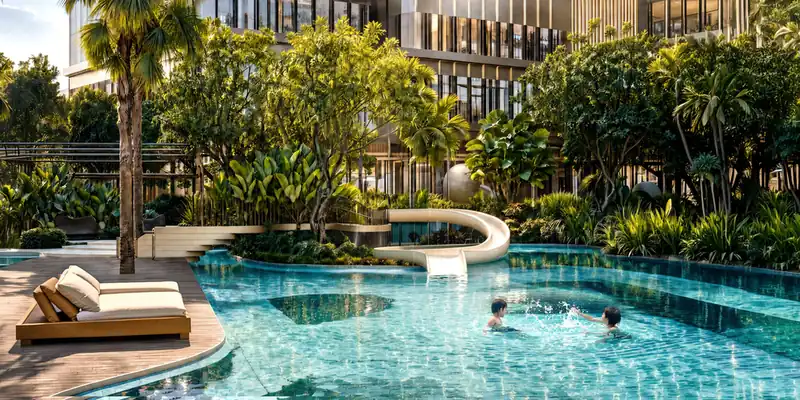 Hồ bơi trẻ em có máng trượt giữa cây xanh tại Palm River