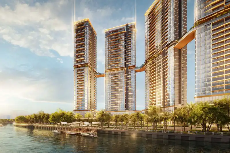 Mặt đứng các tháp Palm River với cầu nối trên cao và hàng cọ dọc bờ sông