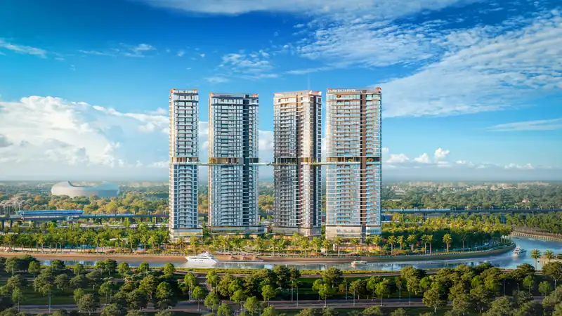 Toàn cảnh bốn tháp Palm River nhìn từ phía cao tốc, phía trước là sông và công viên