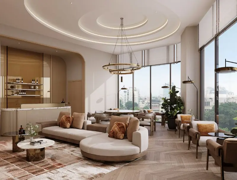 Community Lounge The Westique Residences: sofa, bàn ăn chung và đèn chùm trong không gian sinh hoạt cộng đồng