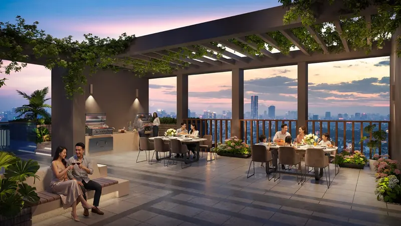 Khu BBQ trên tầng thượng The Westique Residences dưới giàn cây, bàn ăn ngoài trờI nhìn về trung tâm thành phố