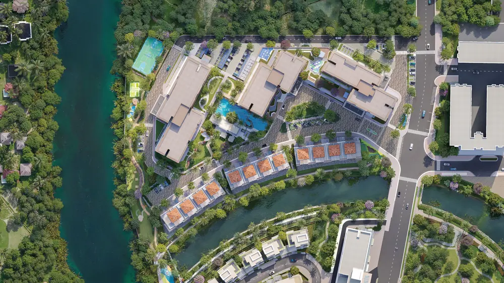 Compound Trellia Cove nhìn từ trên cao: tháp căn hộ, hồ bơi, dãy nhà phố giữa kênh và sông